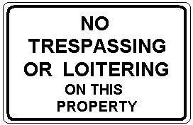 NO TRESPASSING OR LOITERING ON THIS PROPERTY