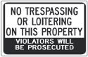 NO TRESPASSING OR LOITERING ON THIS PROPERTY